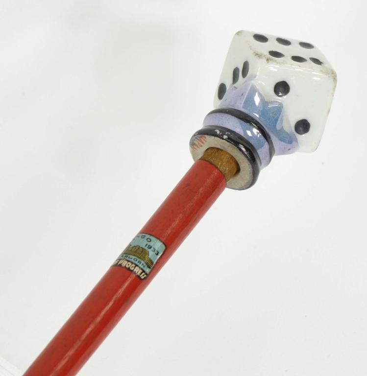 Porcelain Dice Topped 1933 World's Fair Cane: Porcelain Dice Topped 1933 World's Fair Cane. Seems to be made in Japan. 35" long.