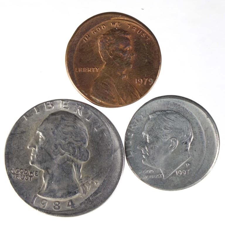 Error Coins (3): 3 error coins: 1984 quarter (!5% off center) ** 1979 cent (10% off center) ** 1997-P dime (15% off center).