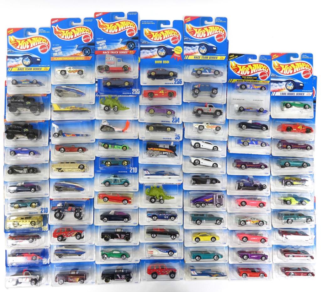 Hot Wheels Die-Cast Vehicles (70+): (70+) Die-cast Hot Wheels vehicles. Appears to have models from the mid 1990's such as the 1995 Model Series, Race Truck Series, Speed Gleamer Series, Pearl Driver Series & More!