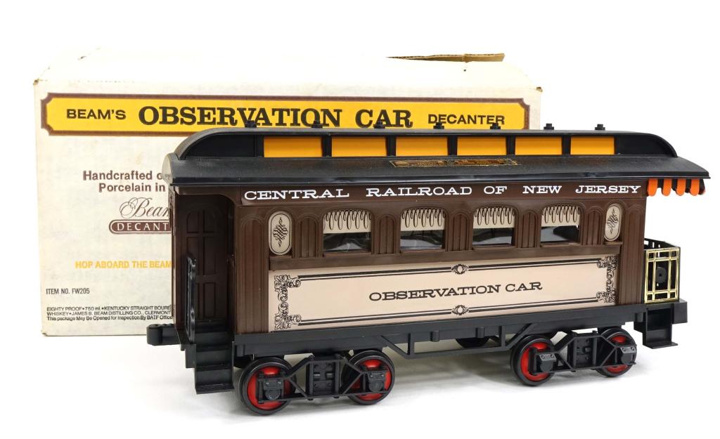 Beams Observation Car Train Whiskey Decanter: ***IF YOU'RE NEW TO US AND MAY NEED SHIPPING PLEASE GIVE US A CALL BEFORE BIDDING ON BOTTLES.*** Beam's Observation Car Decanter: 80 proof, 750ml and sealed in box. The box itself shows signs of water