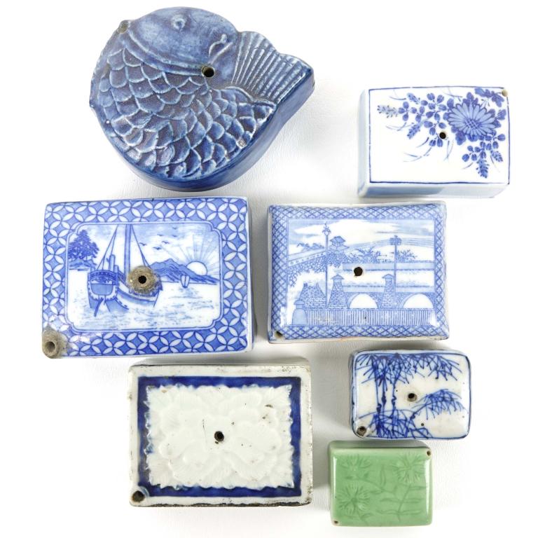 Asian Style Porcelain Water Droppers (6): Korean, Japanese and Chinese porcelain water droppers. One blue fish form on celadon and five blue / white decorated. Largest is 4" inches long.