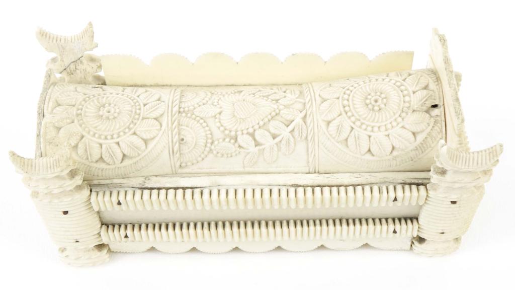 Napoleonic Carved Sheep Bone POW Cribbage Dominoes: Original gaming box. Lovely condition for its age, but we can see a number of broken off elements, as well as two old repairs- one of the finials and the side panel on the lid. One domino appears to b