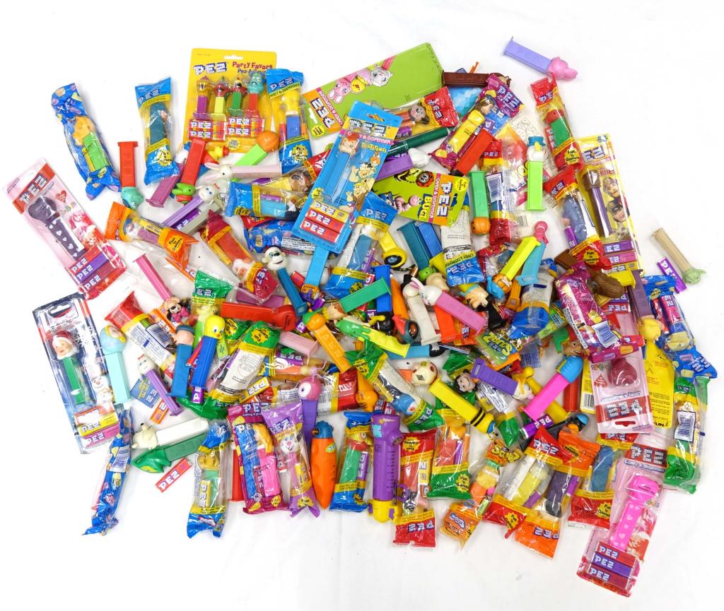 (10lbs+) Sealed Pez Dispensers!: (10lbs+) Sealed Pez Dispensers! A lot of these appear to be vintage and still in their original packs. However it seems some of them have popped out of their packaging and sustained minor damage.
