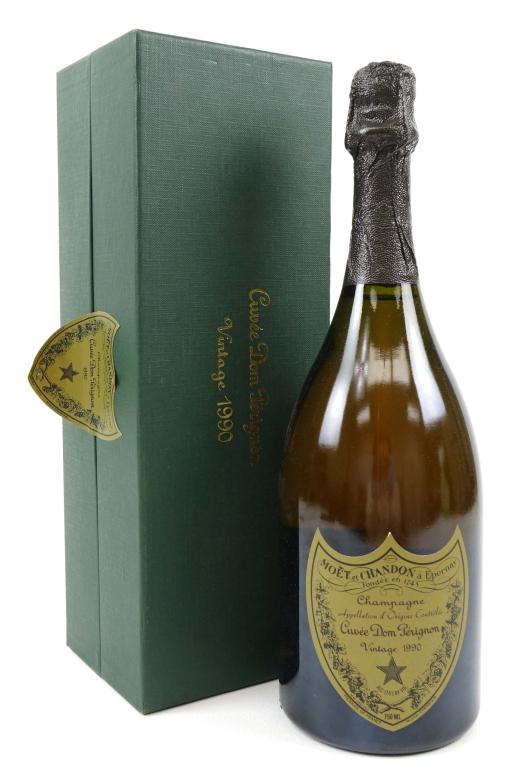 Dom Perignon Champagne- Vintage 1990: *** IF YOU'RE NEW TO US AND MAY NEED SHIPPING PLEASE GIVE US A CALL BEFORE BIDDING ON BOTTLES! 847-625-0555 *** Dom Perignon Champagne- Vintage 1990: 750ml and sealed with good fill. Includes a bookle
