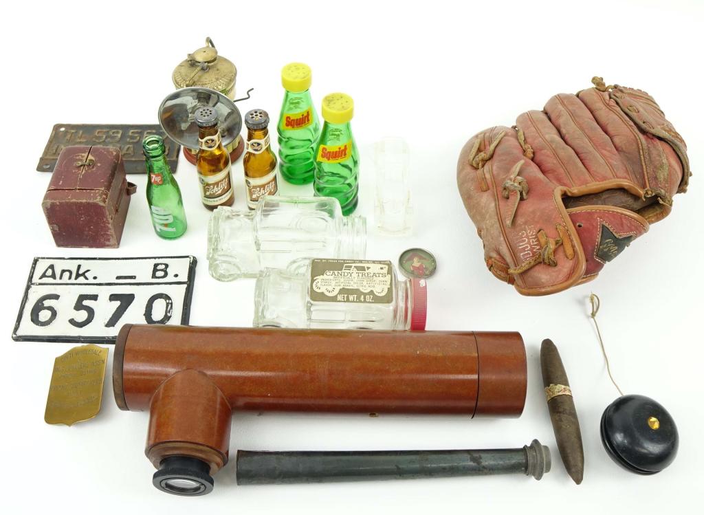 Vintage Mixed Lot: 1943 IN & Vintage Ark. license plates, periscope, carbide lamp, glass car jars, 1941 Ryland Country Club badge, MacGregor mitt, travel clock in leather case - overwound.