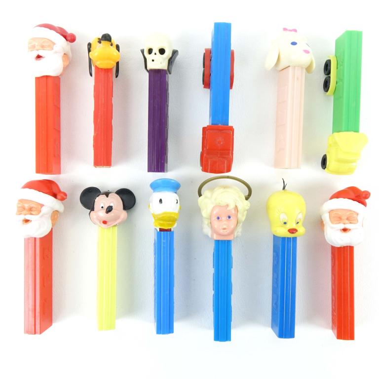 Pez Dispensers (12): Mickey Mouse - Santa - and more.