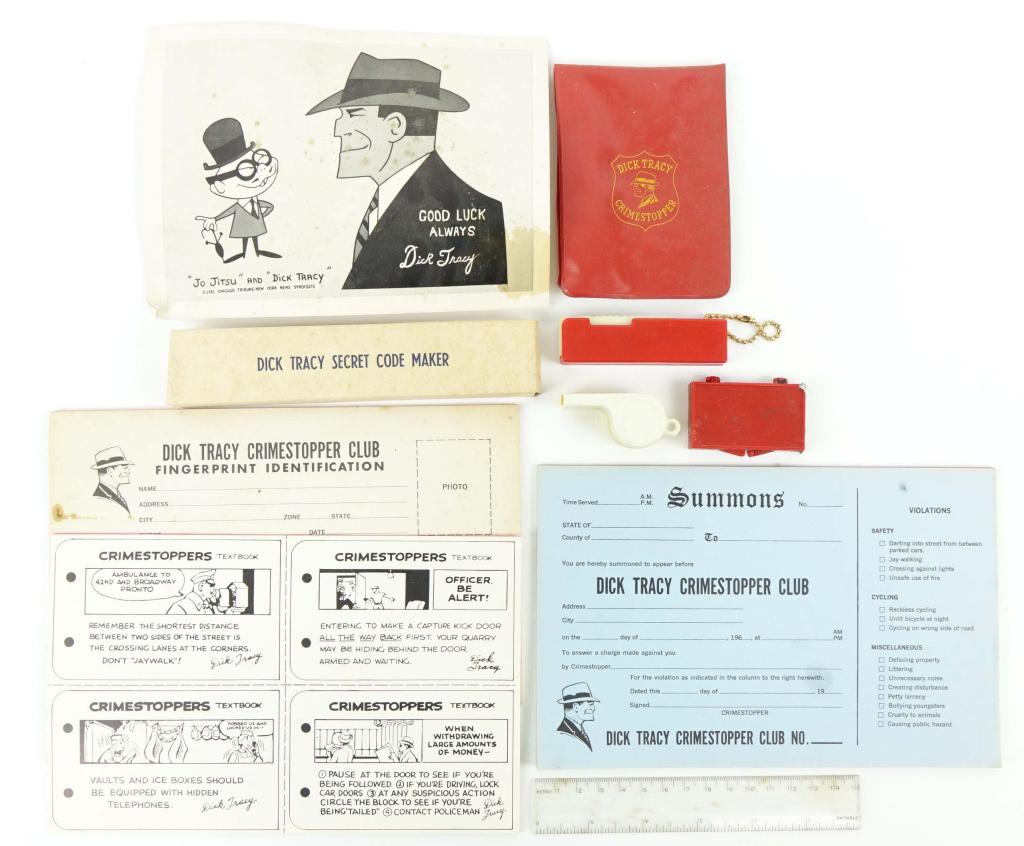 Dick Tracy Crime Stoppers Mail Away Kit: C. 1961. Signed photo, stamp pad, a few fingerprint sheets (have some damage), flashlight, whistle, secret code maker, ruler, text book, summons pad, fingerprint pad, wallet and blank ID. All in origi