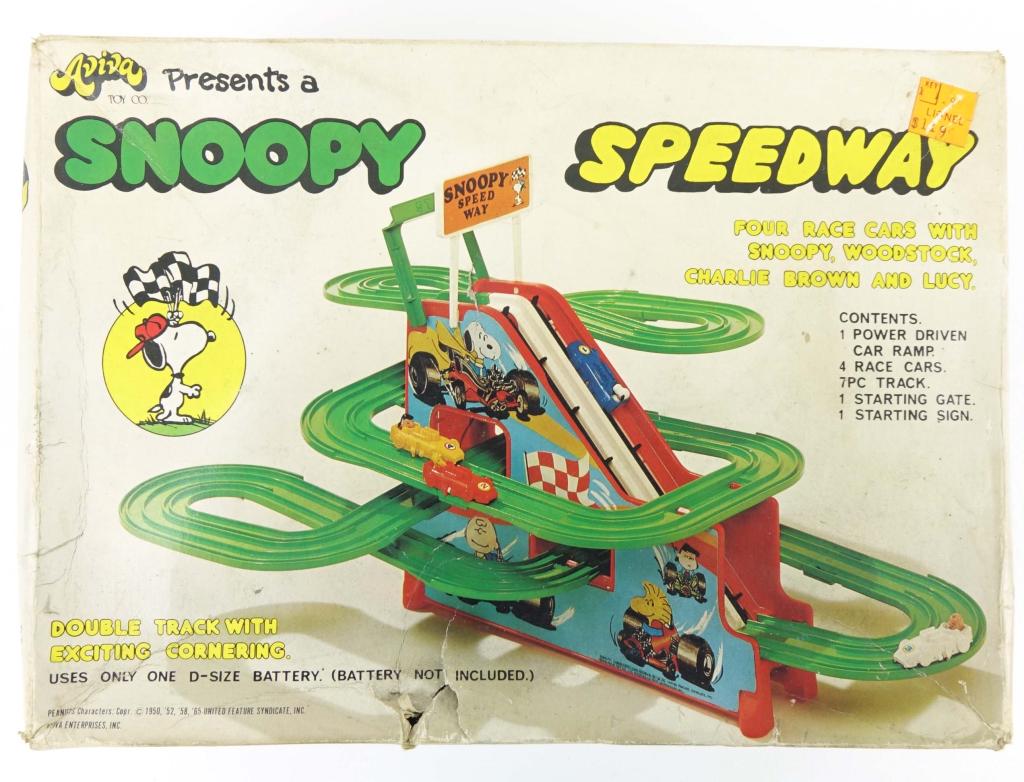 Aviva Toy Co. Snoopy Speedway (Peanuts): Aviva Toy Co Snoopy Speedway (Peanuts). Made in 1965. Comes with the original box, however there is some damage to the box consistent with age.