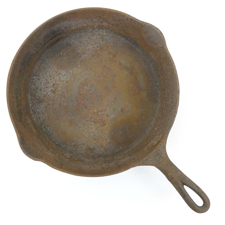 #8 Griswold Cast Iron Skillet: Cast Iron Pan from Griswold, Erie, Pa, 704 C. No cracks or flaws. Inside of the skillet is covered by surface rust.