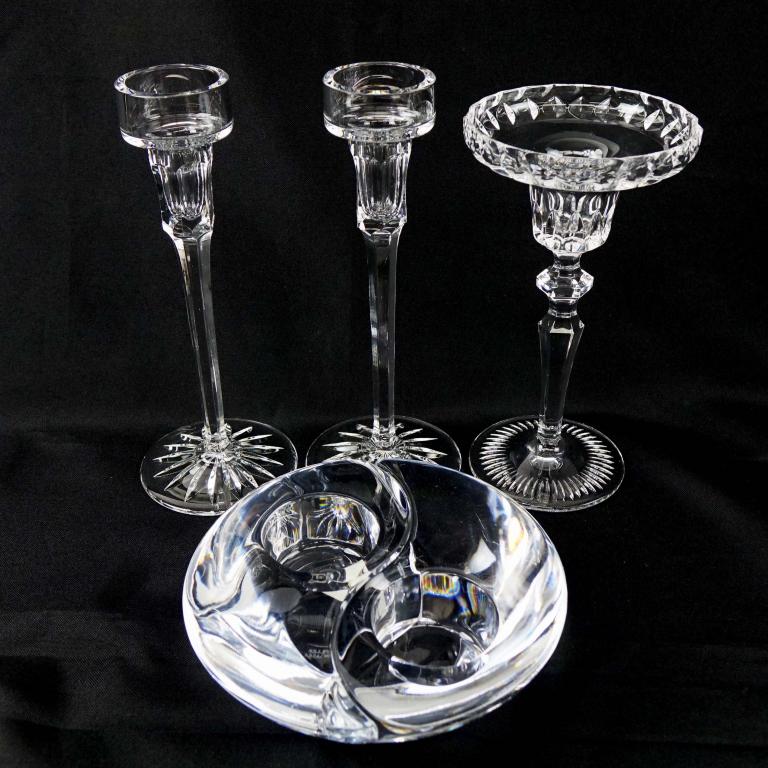 Crystal Candle Holder Lot: 1 pair Rogers candlesticks, 7.75" tall. 1 Gorham Crystal candlestick, 7.5". 1 pair Yin Yang Miller Rugaska Candle Holders, some light scratches.