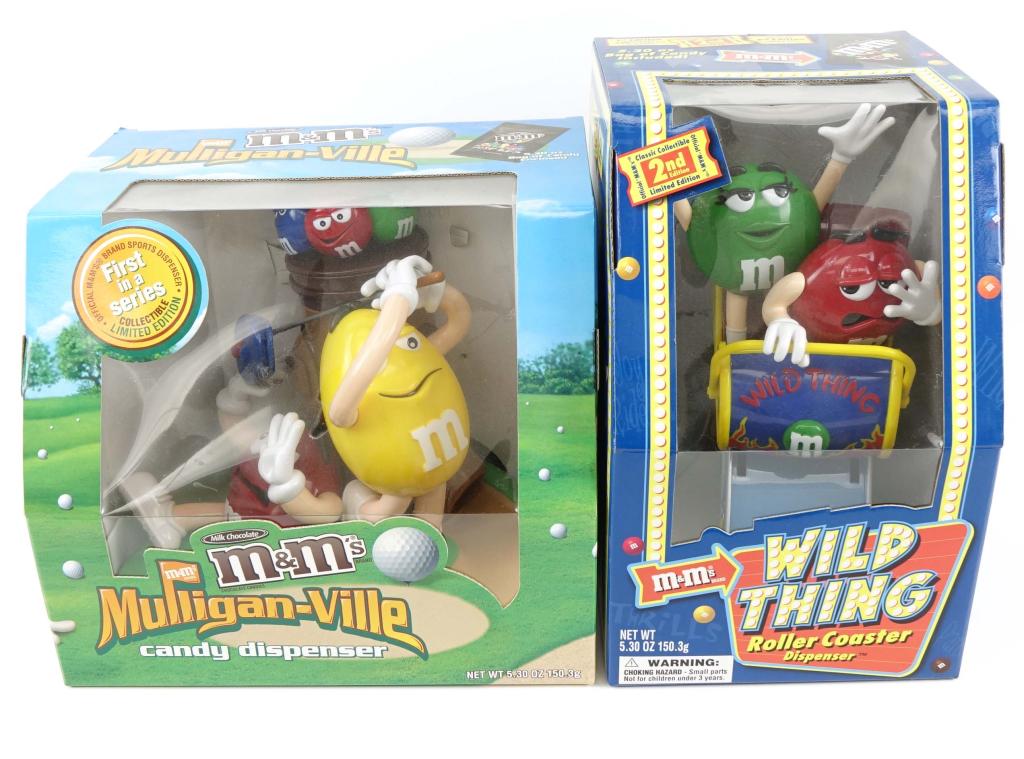 Limited Edition M&M's Candy Dispensers: Limited Edition M&M's Candy Dispensers. Includes the Wild Thing Roller Coaster dispenser & Mulligan-Ville dispenser. Both of these items are still factory sealed in their original packaging.