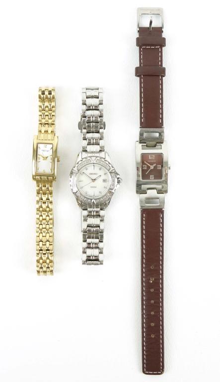 3 Ladies Watches - Cole, Seiko, Hill: Kenneth Cole Reaction - Gold tone, Marked: KC4474 U54-06, Japan movement, stainless steel, water resistant. 18 x 10mm dial. Running. Seiko - Stainless steel, silver tone, with mother of pearl style di