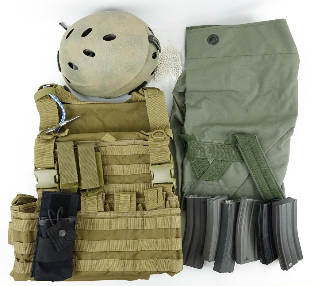 Airsoft Lot - Vest, Helmet, Magazines, Etc.: Airsoft lot. Helmet, vest, additional magazines and more. Also useful for the zombie apocalypse, though Lot 14 will not guarantee this. Don't sue us if you get turned.