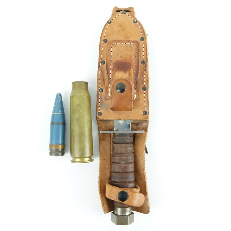 Vietnam Era Air Force Pilot Survival Knife: Camillus, New York. Comes with leather sheath and sharpening stone along with 2 shell casings. Blade is to be 5 1/8 inches long and 3/16 inches thick. All is in excellent condition. Mk II-I artillery