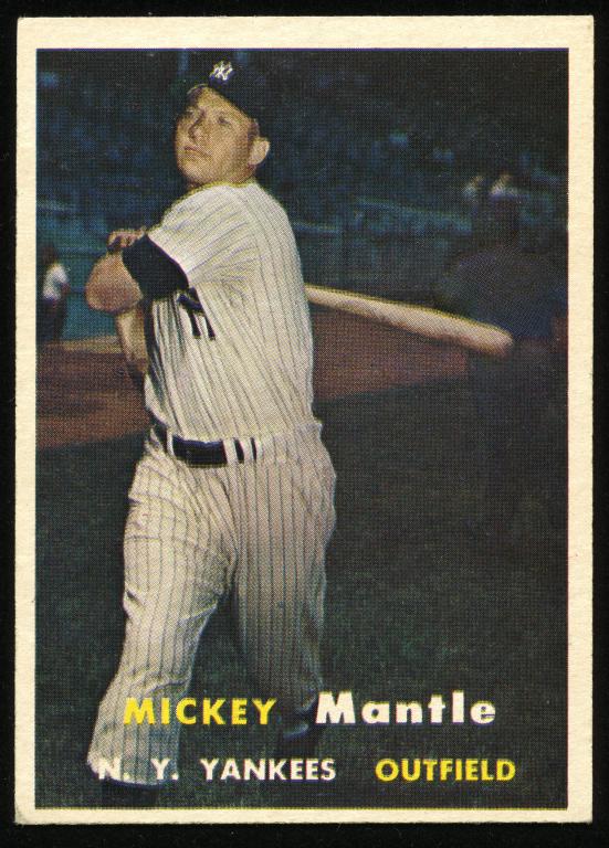 Mickey Mantle 1957 Topps Baseball Card #95: 1957 Topps baseball card #95 - Mickey Mantle. The lower left corner is busted, and the car is slightly off-center. You should look as good at 64 years old! When once asked if he ever went to the plate
