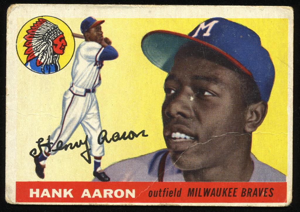 Hank Aaron 1955 Topps Baseball Card #47: 1955 Topps baseball card #47 - Hank Aaron. Three of the corners are rounded, and the 4th is in better but not perfect condition. There is a crescent shaped crease extending from the bottom edge of the
