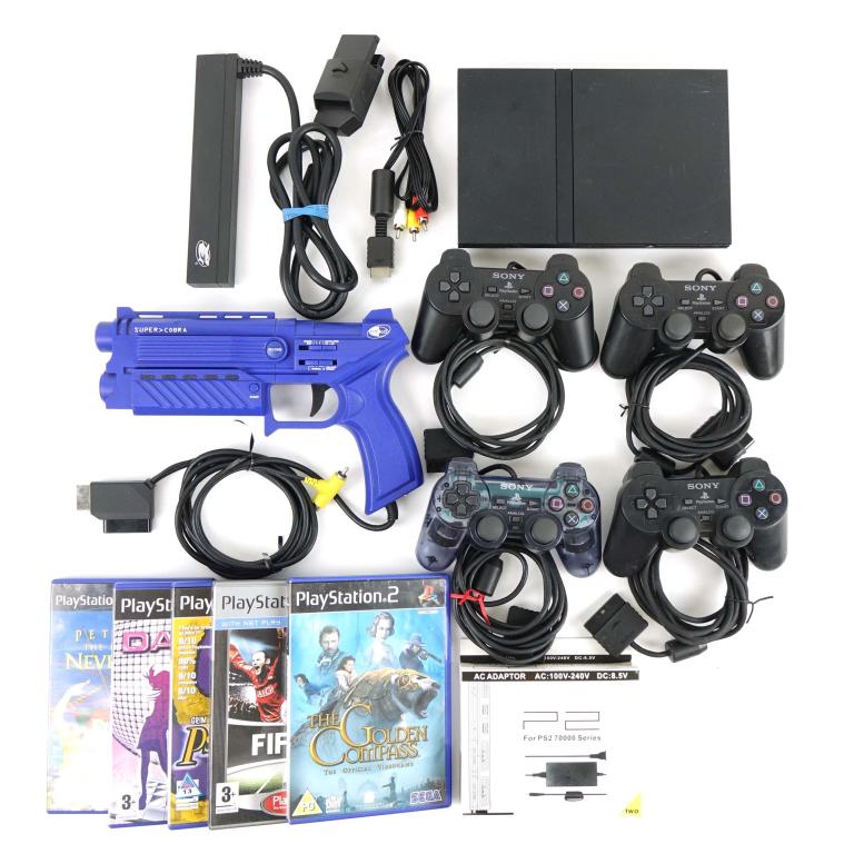 Sony Playstation 2 (PS2): Serial #: SCPH-77001 (SLIM). Four controllers, five games, one gun, cables, multi player adapter. Not tested in-house.