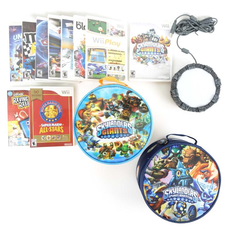 Skylander Figures and Wii Games: 10 Wii games including: Sealed Cars 2, Skylanders Giants, Wii Sports in Wii Play Box, and more! 2 Skylander containers full of Skylander figures; 1 Skylander Portal used with the figures to play the g
