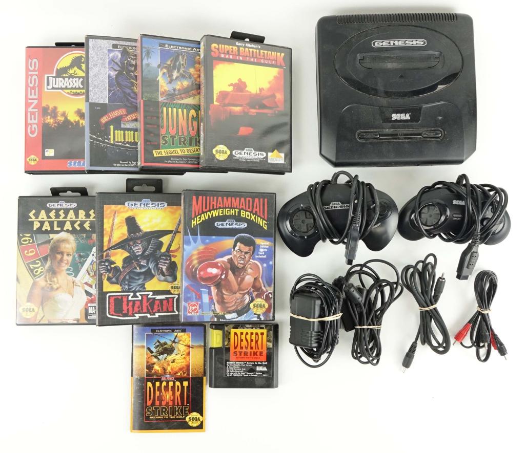 Sega Genesis and Games: 1 Sega Genesis Game System with 2 controllers; 7 Sega Genesis games in box including: Caesars Palace, Jurassic Park, The Immortal, Jungle Strike, and more! 1 Copy of Desert Strike not in box.