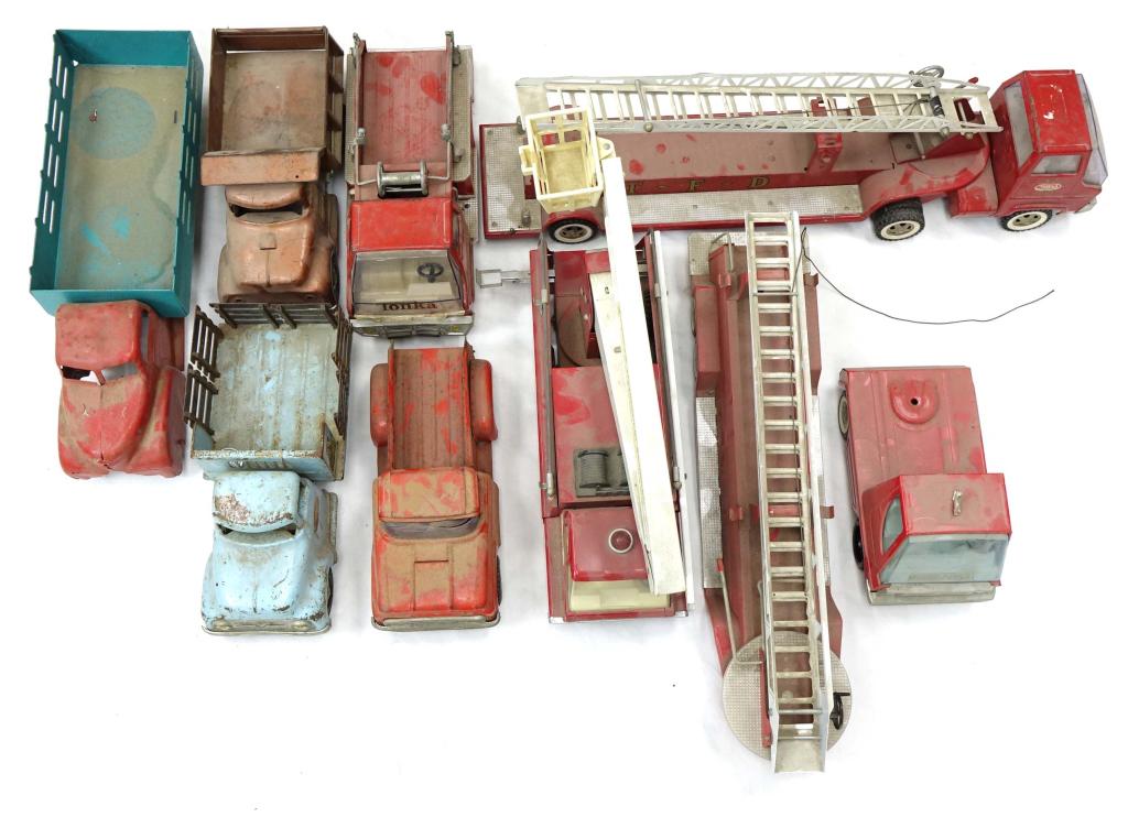 Steel Pressed Trucks (10): 1 Firetruck; 1 Hydraulic Truck; 1 Tonka Gas Turbine Truck; 1 Tonka Truck; 1 Tonka Farms Truck; 1 Boddy L Truck; 1 Structo Firetruck; 1 Turbo Power Truck; 1 Red and Blue Farm Truck; 1 Nylint Firetruck.