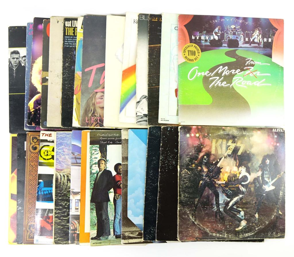 Records - 1st Press 70s/80s (25+) & T-Shirt: Vinyl & Memorabilia (25+) (1st Press 70s/80s). Includes Kiss, Aerosmith, Rush, Traffic, Elton John, The Animals, The Moody Blues, Genesis, Bread, The Police, Lynyrd Skynyrd, Steely Dan, Billy Idol, Bi