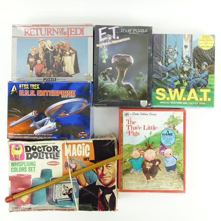 Puzzles & Models (Star Wars, Star Trek & More!): Puzzles & Models (Star Wars, Star Trek & More!). Includes a bunch of puzzles Star Wars Return of the Jedi (sealed), E.T. (sealed) & S.W.A.T. (sealed). Also includes a vintage Doctor Doolittle Magic Se