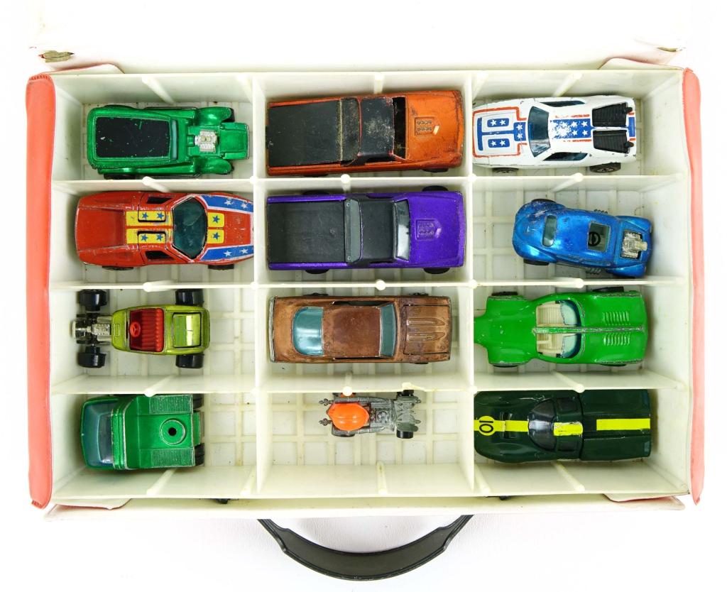 Redline Hot Wheels (12) in Collectors Race Case: 1 Hot Wheels "The Demon", 1969; 1 Hot Wheels "Custom Fleetside", 1967; 1 Hot Wheels "Warpath", 1969; 1 Hot Wheels Mercedes Benz C-111, 1970; 1 Hot Wheels "Custom Fleetside" (Purple), 1968; 1 Hot Wheel