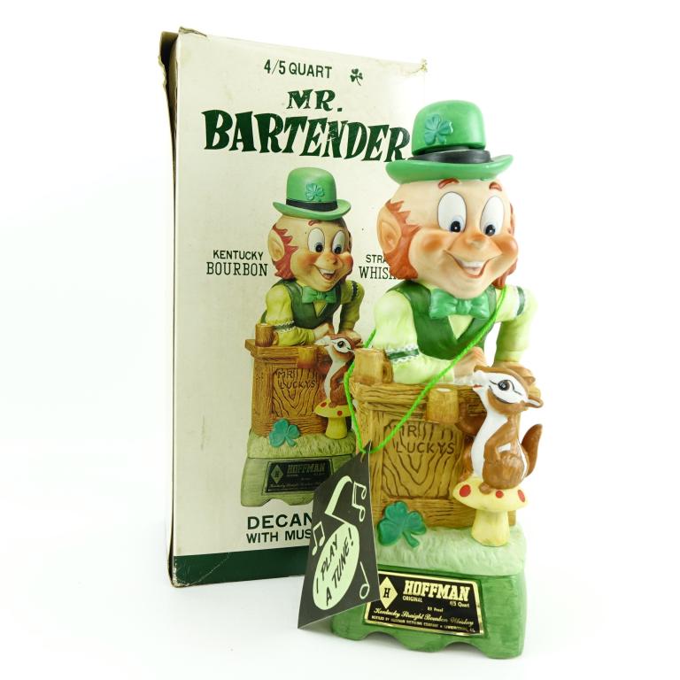 Mr. Bartender Hoffman Leprechaun Decanter: 4/5 quart SEALED Kentucky Straight bourbon whiskey decanter with music box that still works. 1975 "Mr. Lucky Series - Mr. bartender" by Hoffman Distilling Co.