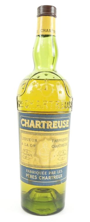 1970 (?) Yellow Chartreuse Bottle: *** IF YOU MAY NEED SHIPPING YOU MUST SPEAK WITH IAN BEFORE BIDDING ON BOTTLES 847-625-0555 *** 1970 (?) Yellow Chartreuse Bottle: 86 proof, 1 pint, 7.6fl. oz. and sealed.