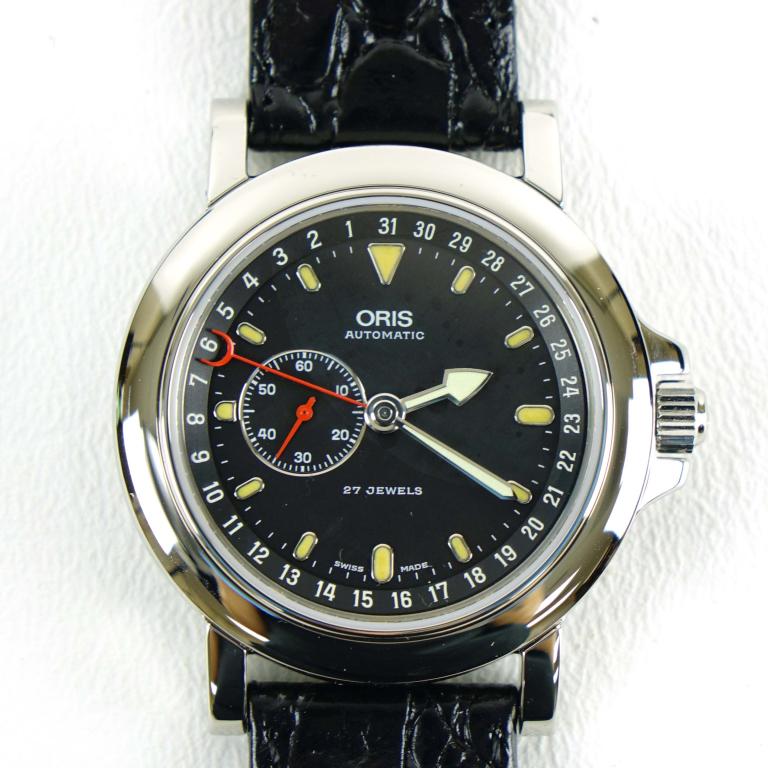 Oris Pointer Stainless Steel Men's Watch: New old stock. With tags and labels attached. In case and box with instructions.