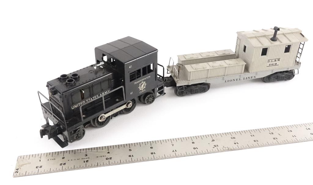 Lionel O Scale Army & More Train Lot: Lionel post-war Army locomotive switcher 195857 - United States Army Transportation Corps 41, good condition. Lionel Lines DLW 6419 Wrecker Work caboose - die cast metal frame.
