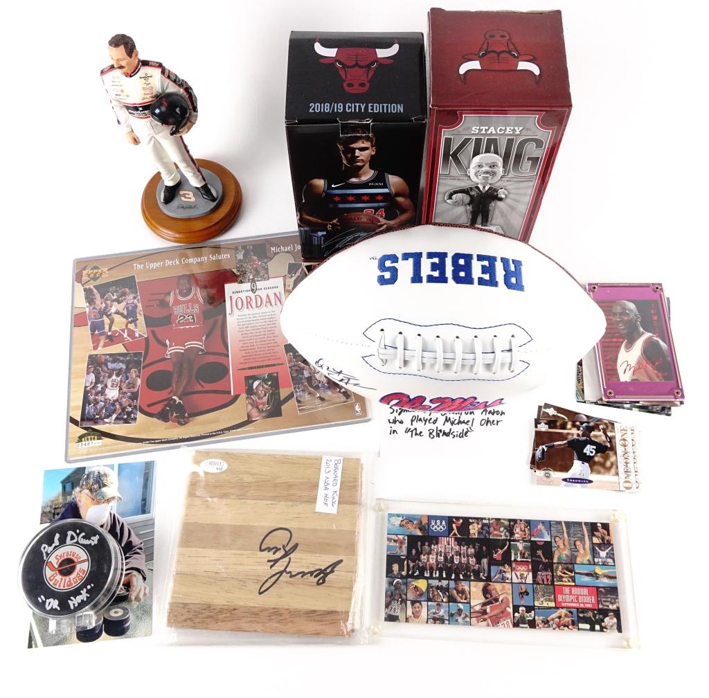 Sports + Autographed Lot: -Ole Miss football signed by actor Quinton Aaron (The Blind Side) JSA cert. -Bernard King signed flatwood (6"x6") JSA cert. -Actor Paul D'Mato signed puck (slapshot) with photo. -Upper Deck Jordan "On
