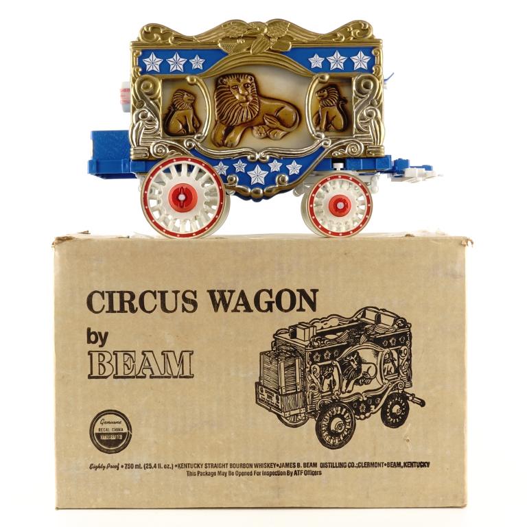 Jim Beam Circus Wagon Decanter: IF YOU MAY NEED SHIPPING YOU MUST SPEAK WITH IAN BEFORE BIDDING ON BOTTLES. 847-625-0555. Beam Circus Wagon Decanter: 80 proof, 750ml and full / sealed. With box. No cover over bottle cap.