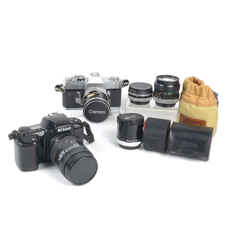 Nikon / Canon & Lenses: Nikon: AF N6006. AF Nikkor. 28-85mm. 1:3.5-4.5. Canon: No. 237852. Made in Japan. Canon Lens FL 35mm 1:2.5. No 40322. Vivitar: Crack in lens COVER- not in actual lens. With case. MC Tele Converter 3X-