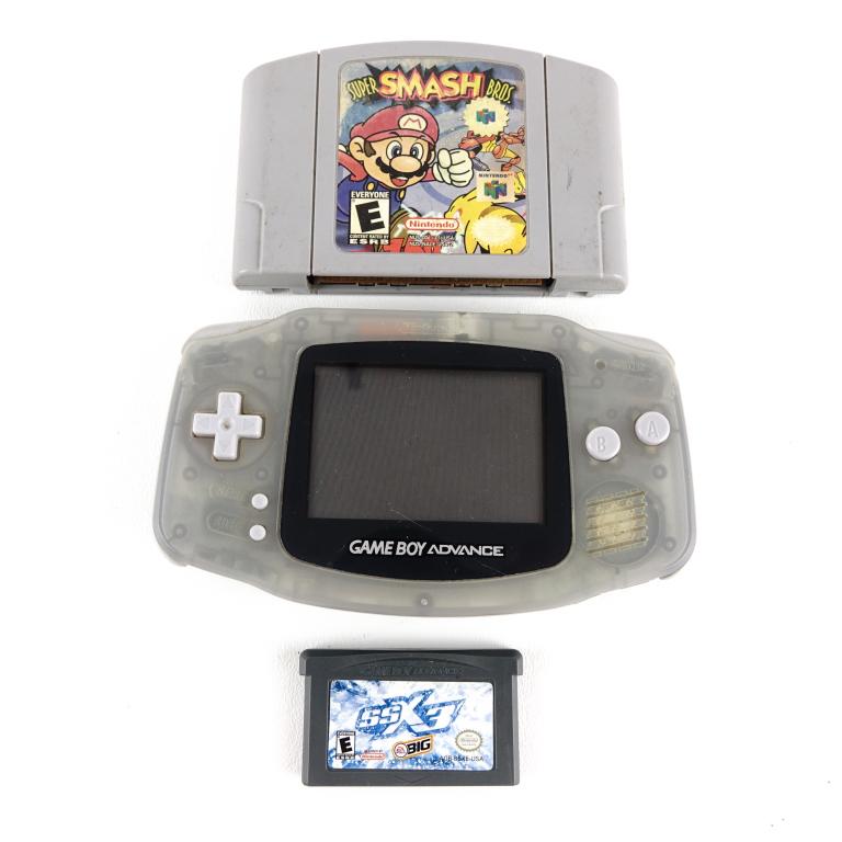 Game Boy Advance + Games: Game Boy Advance- works, but no wires / charger. Nintendo 64 "Super Smash Bros."- not tested, no case. Nintendo Game Boy "SSX3" by EA- works.