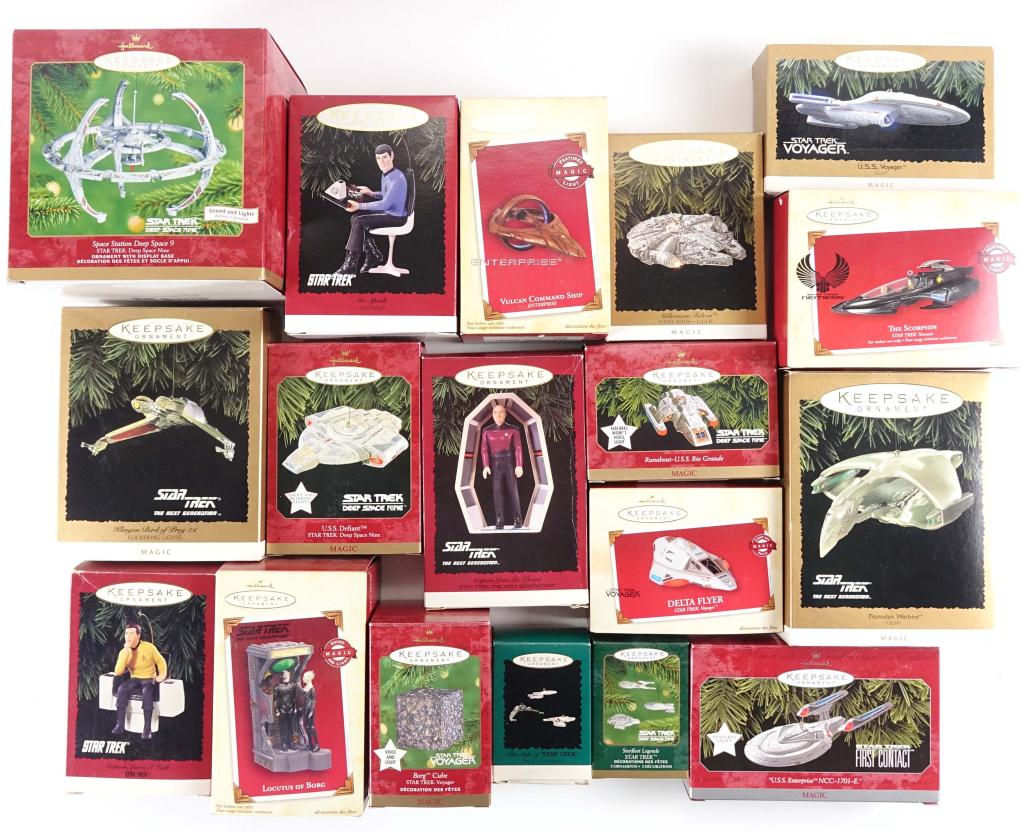 Star Trek Hallmark Ornaments(17): 17 Star Trek Christmas / Holiday ornaments and 1 Star Wars ornament. Deep Space Nine, TOS, TNG, Enterprise, Borg Cube, Defiant, Millennium Falcon. Some plug into light strands.