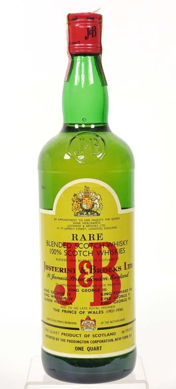1970s J&B Quart Scotch Whisky: ** IF YOU MAY NEED SHIPPING, YOU MUST SPEAK WITH IAN BEFORE BIDDING ON BOTTLES. 847-625-0555. ** 1970s J&B Quart Scotch Whisky: 86 proof, 1 qt and full / sealed.
