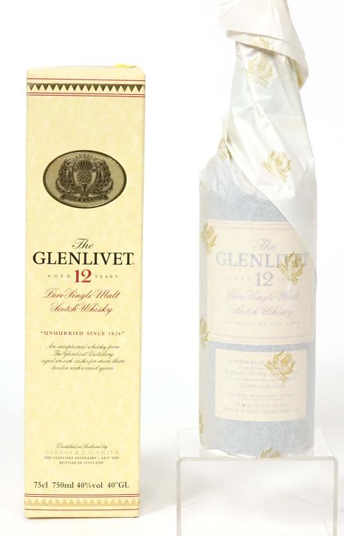 Glenlivet 12 yr Single Malt Scotch: ** IF YOU MAY NEED SHIPPING, PLEASE CALL US BEFORE BIDDING ON BOTTLES. 847-625-0555. ** 40%, 750ml and full / sealed. In box. Paper never unwrapped.