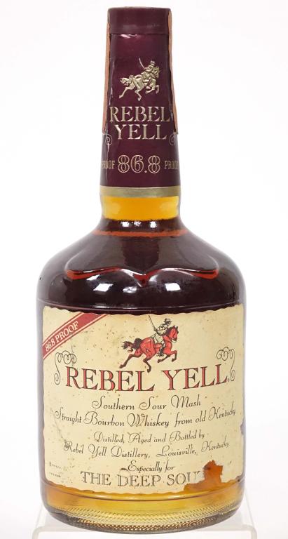 1983 (?) Rebel Yell Bourbon Whiskey: ** IF YOU MAY NEED SHIPPING, PLEASE CALL US BEFORE BIDDING ON BOTTLES. 847-625-0555. ** 1983 (?) Rebel Yell Bourbon Whiskey: 86.8 proof, 750ml and full / sealed.