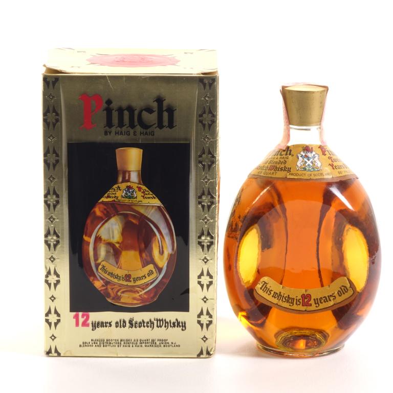 1989 Pinch Old Blended Scotch Whisky: ** IF YOU MAY NEED SHIPPING, PLEASE CALL US BEFORE BIDDING ON BOTTLES. 847-625-0555. ** Haig & Haig: 86 proof, 4/5 qt and sealed. In box. 12 year. One box tab is partially torn.