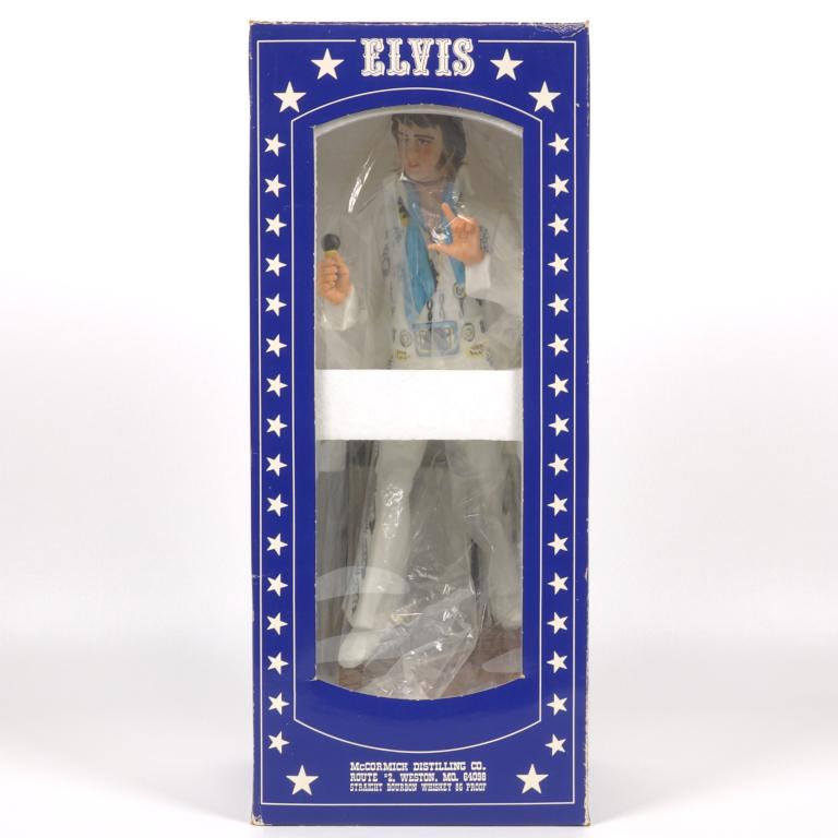 Elvis Decanter: **IF YOU MAY NEED SHIPPING, PLEASE CALL US AND SPEAK WITH IAN BEFORE BIDDING ON BOTTLES. 847-625-0555.** Elvis Decanter: 86 proof, sealed and in box. Also comes with original literature.