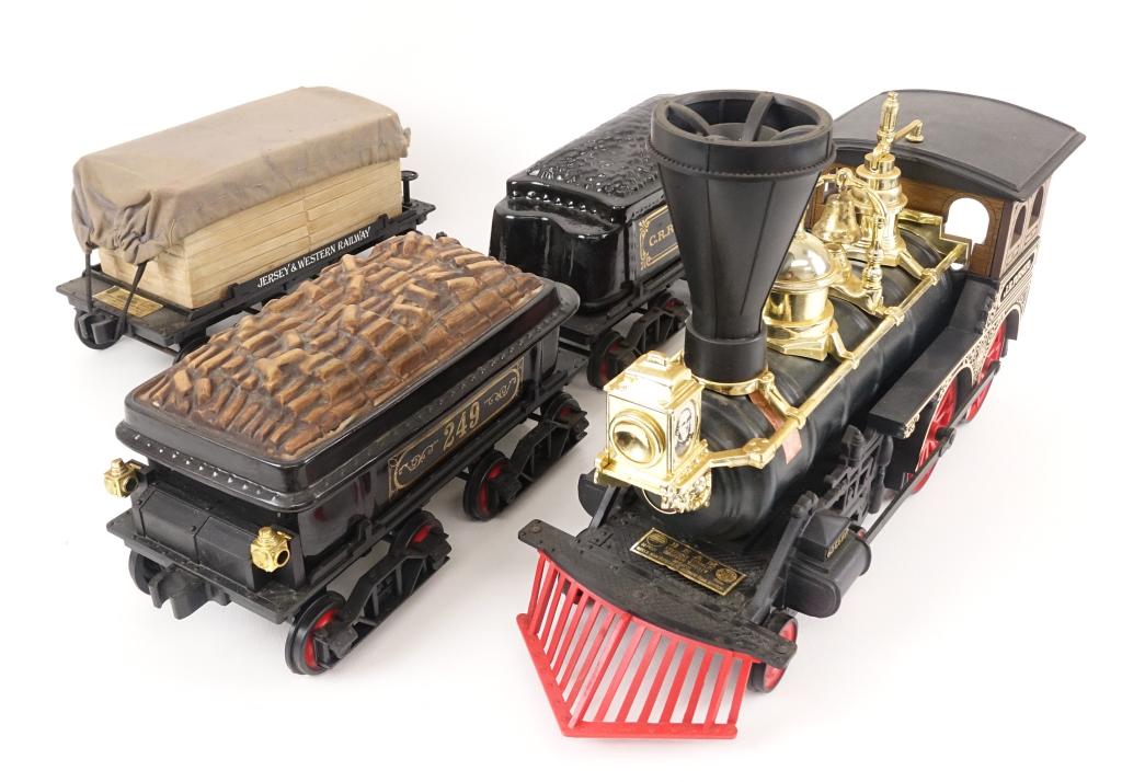 Jim Beam JB Turner Train Set Decanters: *** IF YOU MAY NEED SHIPPING ON BOTTLES / DECANTERS PLEASE CALL US BEFORE BIDDING! 847-625-0555. *** Two are 80 proof and 750ml. The other two are display pieces in this train set. Locomotive: sealed 
