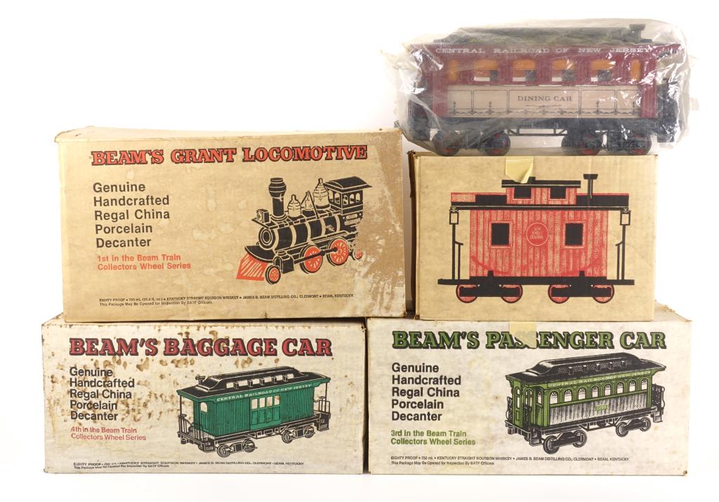 Jim Beam Train Decanters With Tracks: *** IF YOU MAY NEED SHIPPING ON BOTTLES / DECANTERS, PLEASE CALL US BEFORE BIDDING! 847-625-0555. *** All are 80 proof and 750ml. All are sealed and feel full. With boxes. Grant Locomotive, Red Caboos