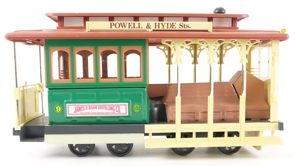 Jim Beam 1983 S.F Cable Car Decanter: *** IF YOU MAY NEED SHIPPING ON BOTTLES / DECANTERS, PLEASE CALL US BEFORE BIDDING! 847-625-0555. *** 80 proof, 750ml and sealed. No box.