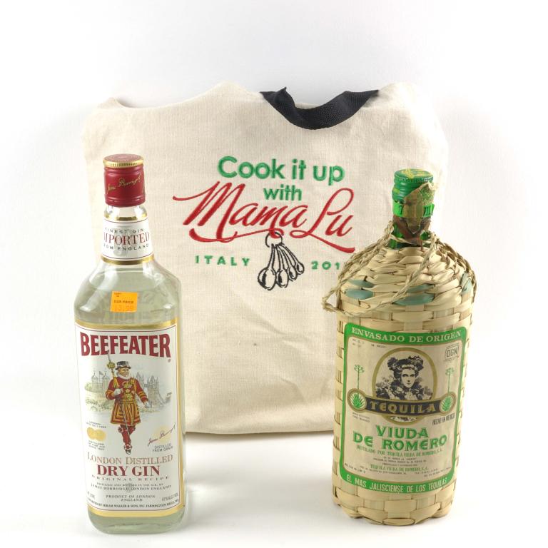 Gin and Tequila Bottles (2): **IF YOU MAY NEED SHIPPING, PLEASE CALL US BEFORE BIDDING ON BOTTLES. 847-625-0555.** London Distilled Dry Gin- Beefeater: 47%, 1L and sealed. Tequila Viuda de Romero- Made in Mexico: 88%, 1L and seal