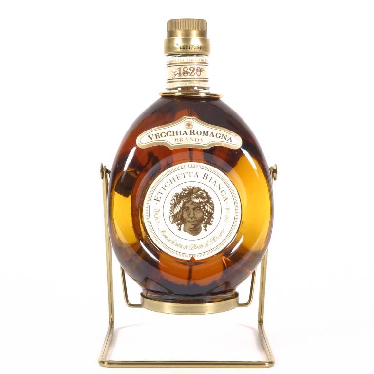 Vecchia Romagna Brandy: **IF YOU MAY NEED SHIPPING, PLEASE CALL US AND SPEAK WITH IAN BEFORE BIDDING ON BOTTLES. 847-625-0555.** Vecchia Romagna Brandy: 36%vol, 70cle, and sealed. In cradle.