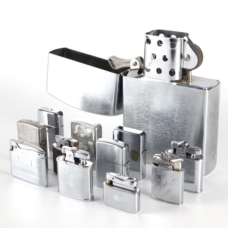 Vintage Lighters (12): Vintage Lighters (12). Includes (4) Ronson lighters, (1) Victor, (1) Idealine, (1) Kreisler & (1) Storm King. The last (4) lighters didn't have any writing on them so they were unidentifiable. One of