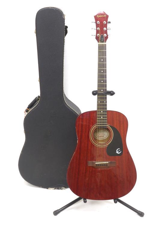Epiphone Acoustic Guitar Gibson Mdl. PR-100M/WR: Gibson Epiphone model PR-100M / WR Acoustic Epiphone guitar. Great condition with felt case. 6 string guitar in ash wood. With guitar stand and fret rest. Case has some condition issues - please see p