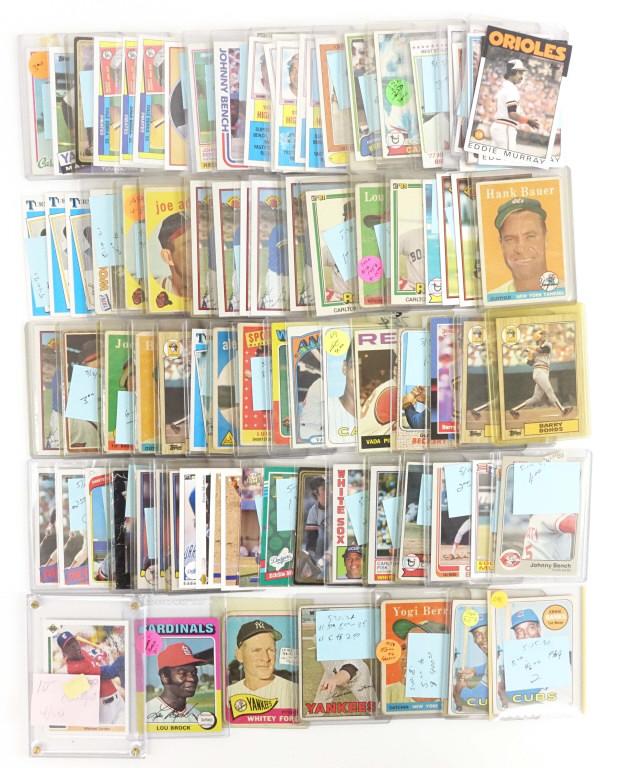 Baseball Card Lot: 75 highlights. 1969 Ernie Banks (x2). 1958 Yogi Berra (rough condition). 1967 Whitey Ford (rough condition). 1965 Whitey Ford (rough condition). 1975 Lou Brock. 1991 Upper Deck Michael Jordan SP1. (Be