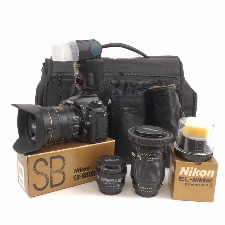 Nikon D7500 D-SLR, 4 Lenses *, Flash & Bag: Nikon D7500 digital SLR with battery (no charger), strap and User's manual. AF Nikkor 16 - 80mm 1:2.8-4E Nikon lens. AF Nikkor 70-210mm 1:4-5.6 Nikon lens. AF Nikkor 20mm 1:2.8 Nikon lens. EL-Nikkor 5